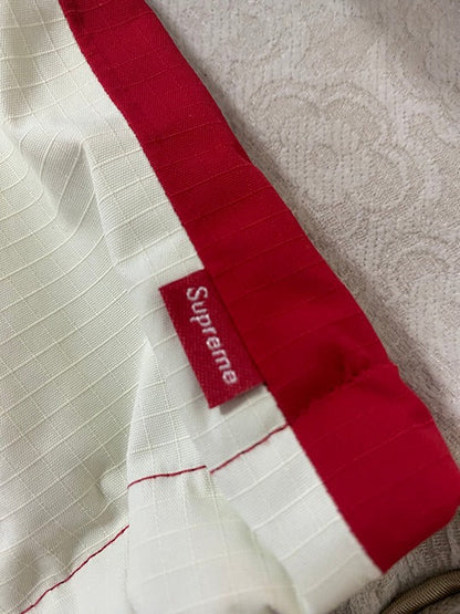 The North Face Supreme Red and white Goretex hooded waterproof jacket